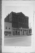 907-11 W NATIONAL AVE, a Italianate large retail building, built in Milwaukee, Wisconsin in 1875.
