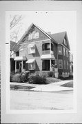 2029-2031 N NEWHALL, a Queen Anne duplex, built in Milwaukee, Wisconsin in 1911.
