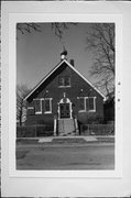 1136 W MADISON ST, a Late Gothic Revival church, built in Milwaukee, Wisconsin in 1909.