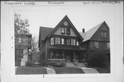 3019-3021 W MCKINLEY BLVD, a Craftsman duplex/two-flat, built in Milwaukee, Wisconsin in 1905.