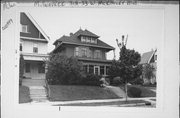 3131-3133 W MCKINLEY BLVD, a American Foursquare house, built in Milwaukee, Wisconsin in 1909.