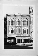704-708 N MILWAUKEE ST, a Italianate large retail building, built in Milwaukee, Wisconsin in 1866.