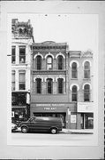 714 N MILWAUKEE ST, a Italianate retail building, built in Milwaukee, Wisconsin in 1874.