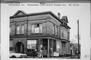 2100-2104 N PALMER ST, a Neoclassical/Beaux Arts large retail building, built in Milwaukee, Wisconsin in 1895.