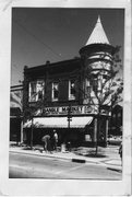 302 STATE ST, a Queen Anne small retail building, built in Madison, Wisconsin in 1899.