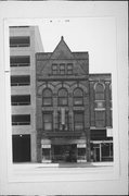 751 N PLANKINTON AVE, a Romanesque Revival small office building, built in Milwaukee, Wisconsin in 1898.