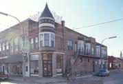 100 E MADISON ST, a Queen Anne small retail building, built in Waterloo, Wisconsin in 1893.