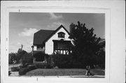 2401-2403 N SHERMAN BLVD, a English Revival Styles duplex/two-flat, built in Milwaukee, Wisconsin in 1915.