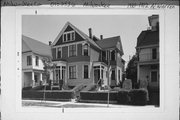 1910-1912 N WARREN AVE, a Queen Anne duplex/two-flat, built in Milwaukee, Wisconsin in 1893.