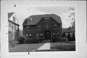 731 W WASHINGTON ST (1103-15 S 7TH ST), a Craftsman small office building, built in Milwaukee, Wisconsin in 1919.