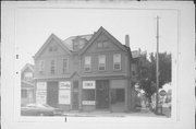 1335-1339 W WASHINGTON, a Queen Anne retail building, built in Milwaukee, Wisconsin in 1889.