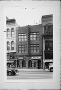 632-634 N WATER ST, a Arts and Crafts retail building, built in Milwaukee, Wisconsin in 1928.