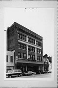 1119-25 N WATER ST, a Neoclassical/Beaux Arts retail building, built in Milwaukee, Wisconsin in 1909.