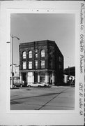 1245 N WATER ST, a Romanesque Revival retail building, built in Milwaukee, Wisconsin in 1890.