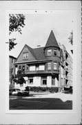 712 E WELLS ST, a Queen Anne house, built in Milwaukee, Wisconsin in 1892.
