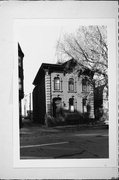 718 E WELLS ST, a Italianate house, built in Milwaukee, Wisconsin in 1874.