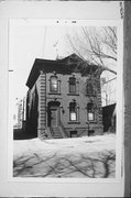 718 E WELLS ST, a Italianate house, built in Milwaukee, Wisconsin in 1874.