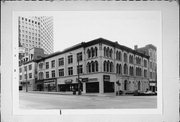 307 E WISCONSIN AVE (AKA 301-315 E WISCONSIN AVE), a Italianate large retail building, built in Milwaukee, Wisconsin in 1867.