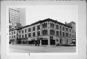 307 E WISCONSIN AVE (AKA 301-315 E WISCONSIN AVE), a Italianate retail building, built in Milwaukee, Wisconsin in 1867.