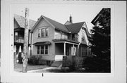 2428 S WOODWARD ST, a Queen Anne duplex, built in Milwaukee, Wisconsin in 1910.