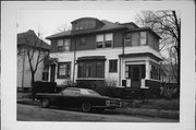 211-215 W WRIGHT ST, a Colonial Revival/Georgian Revival duplex/two-flat, built in Milwaukee, Wisconsin in 1907.