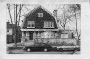 415 N CARROLL ST, a Dutch Colonial Revival house, built in Madison, Wisconsin in 1907.