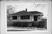 7758 W MENOMONEE RIVER PKWY, a Prairie School house, built in Wauwatosa, Wisconsin in 1922.