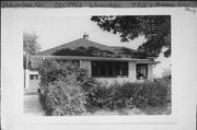 7758 W MENOMONEE RIVER PKWY, a Prairie School house, built in Wauwatosa, Wisconsin in 1922.
