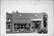 6907-6909 W NORTH AVE, a Twentieth Century Commercial retail building, built in Wauwatosa, Wisconsin in 1927.