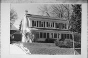6426 UPPER PARKWAY N, a Dutch Colonial Revival house, built in Wauwatosa, Wisconsin in 1919.