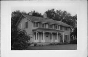 12323 WATERTOWN PLANK RD, a Greek Revival house, built in Wauwatosa, Wisconsin in 1856.