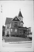 1409-1411 S 60TH ST, a Queen Anne house, built in West Allis, Wisconsin in 1906.
