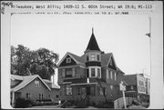 1409-1411 S 60TH ST, a Queen Anne house, built in West Allis, Wisconsin in 1906.
