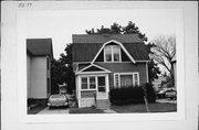 1575 S 80TH ST, a Dutch Colonial Revival house, built in West Allis, Wisconsin in 1907.