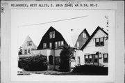 2028-30 S 84TH ST, a Dutch Colonial Revival house, built in West Allis, Wisconsin in 1909.