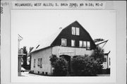 2028-30 S 84TH ST, a Dutch Colonial Revival house, built in West Allis, Wisconsin in 1909.