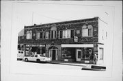 5909-5915 W BURNHAM ST, a Commercial Vernacular large retail building, built in West Allis, Wisconsin in 1928.