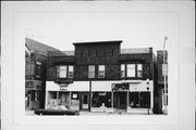 8118-8122 W NATIONAL AVE, a Boomtown retail building, built in West Allis, Wisconsin in 1888.