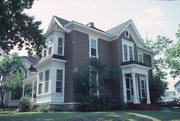 303 W GRAND AVE, a Queen Anne house, built in Beloit, Wisconsin in 1885.