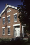 10706 N Tolles Rd (AKA STATE HIGHWAY 138, JUST SOUTH OF COOKSVILLE), a Greek Revival house, built in Porter, Wisconsin in 1845.