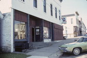 101-107 E MAIN ST, a Commercial Vernacular large retail building, built in Evansville, Wisconsin in 1893.