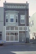 17 W MAIN ST, a Queen Anne small retail building, built in Evansville, Wisconsin in 1903.
