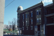 52 S MAIN ST, a Queen Anne retail building, built in Janesville, Wisconsin in 1895.