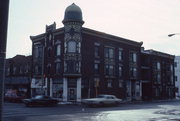 52 S MAIN ST, a Queen Anne retail building, built in Janesville, Wisconsin in 1895.