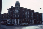 52 S MAIN ST, a Queen Anne large retail building, built in Janesville, Wisconsin in 1895.