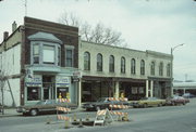 117 N MAIN ST, a Queen Anne retail building, built in Janesville, Wisconsin in 1858.