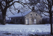 440 N JACKSON ST, a Greek Revival house, built in Janesville, Wisconsin in 1857.