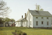 N SIDE OF CREEK RD, OPP 1/4 MIL N OF TRACKS, N TIFFANY, a Greek Revival house, built in La Prairie, Wisconsin in 1846.