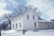 N SIDE OF CREEK RD, OPP 1/4 MIL N OF TRACKS, N TIFFANY, a Greek Revival house, built in La Prairie, Wisconsin in 1846.