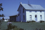 N SIDE OF CREEK RD, OPP 1/4 MIL N OF TRACKS, N TIFFANY, a Greek Revival house, built in La Prairie, Wisconsin in 1846.